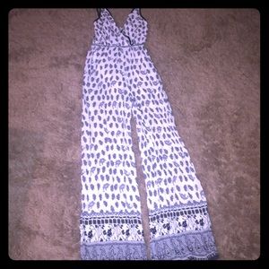 WHITE, BLUE, AND GRAY JUMPSUIT